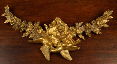 Lot 41 - A gilt plaster mirror mount depicting love birds among floral sprays