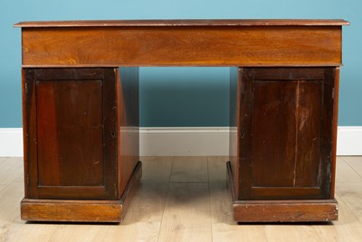 Lot 229 - A mahogany partners desk with leather inset top