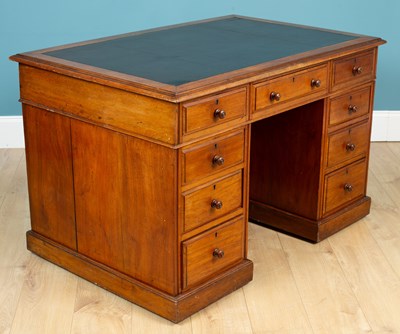 Lot 229 - A mahogany partners desk with leather inset top