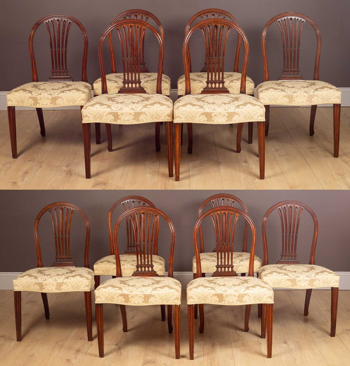 Lot 357 - Set a set of twelve Hepplewhite mahogany dining chairs