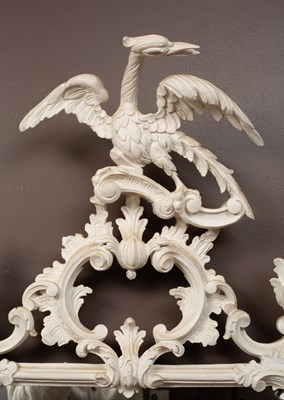 Lot 302 - A Georgian style white painted Rococo wall mirror