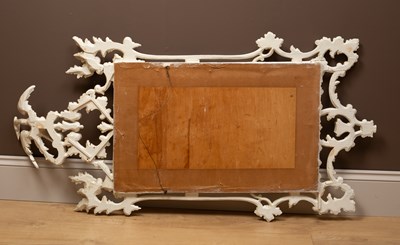 Lot 302 - A Georgian style white painted Rococo wall mirror