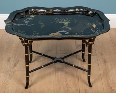 Lot 337 - A tray top coffee table