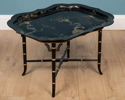 Lot 337 - A tray top coffee table