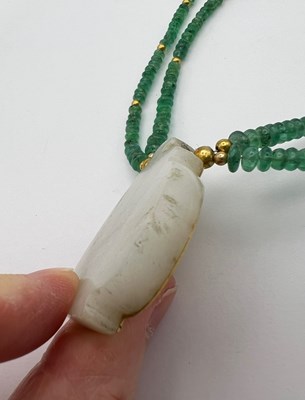 Lot 46 - An Indian gem set pendant necklace, the shaped...