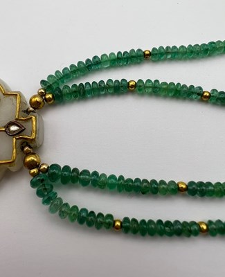 Lot 46 - An Indian gem set pendant necklace, the shaped...
