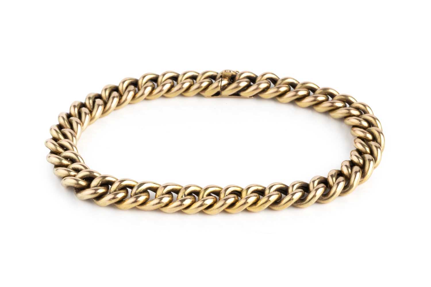 Lot 149 - A yellow precious metal curb-link bracelet, of...