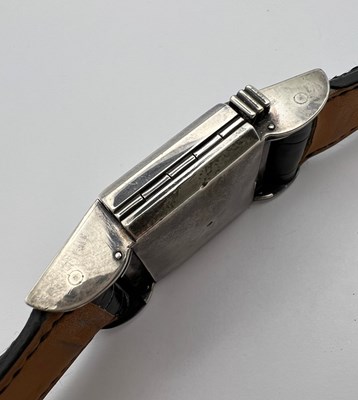 Lot 258 - A 'belt buckle' wristwatch by Hermès, the...