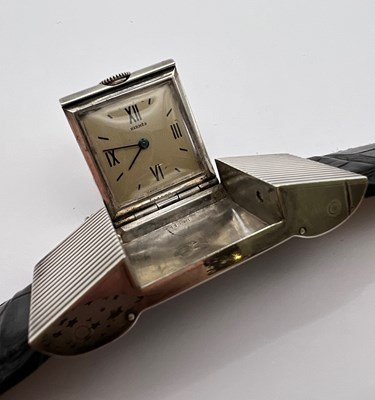 Lot 258 - A 'belt buckle' wristwatch by Hermès, the...
