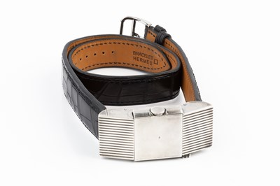 Lot 258 - A 'belt buckle' wristwatch by Hermès, the...