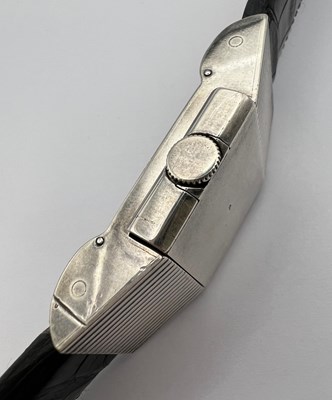 Lot 258 - A 'belt buckle' wristwatch by Hermès, the...