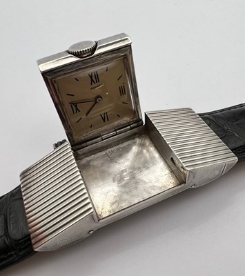 Lot 258 - A 'belt buckle' wristwatch by Hermès, the...