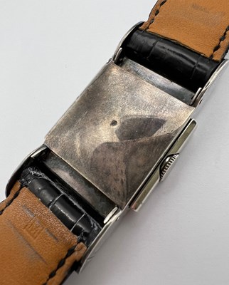 Lot 258 - A 'belt buckle' wristwatch by Hermès, the...