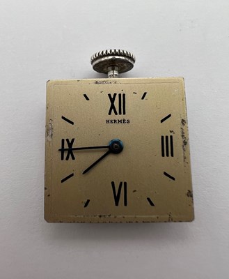 Lot 258 - A 'belt buckle' wristwatch by Hermès, the...