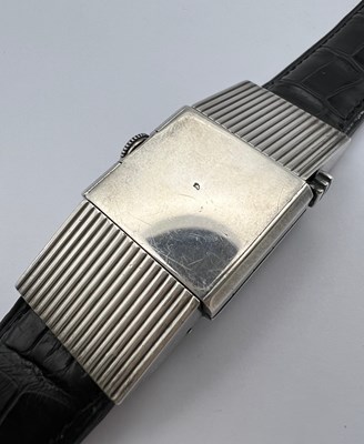 Lot 258 - A 'belt buckle' wristwatch by Hermès, the...