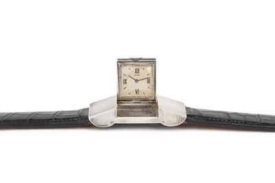 Lot 258 - A 'belt buckle' wristwatch by Hermès, the...