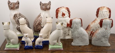 Lot 298 - Group of Staffordshire pottery cats and dogs...