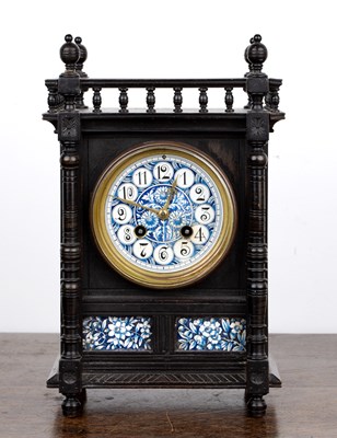 Lot 86 - Aesthetic movement mantel clock In an ebonised...