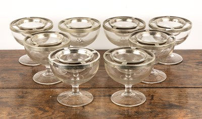 Lot 333 - Set of eight glass footed caviar dishes with...