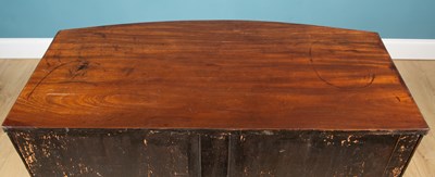 Lot 141 - A Regency mahogany bow front chest of two...