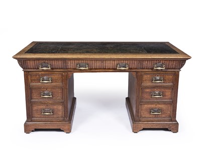 Lot 66 - A Victorian oak pedestal desk with a green...