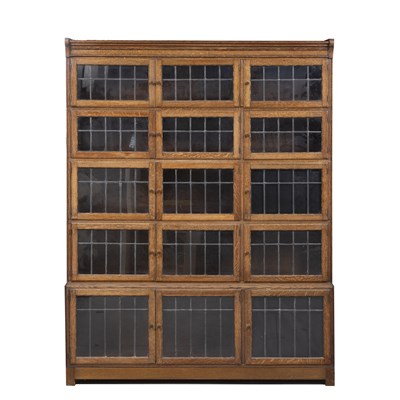 Lot 68 - An early 20th century Minty oak bookcase with...