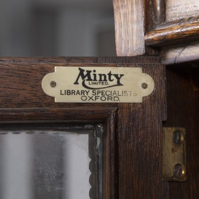 Lot 68 - An early 20th century Minty oak bookcase with...