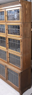 Lot 68 - An early 20th century Minty oak bookcase with...