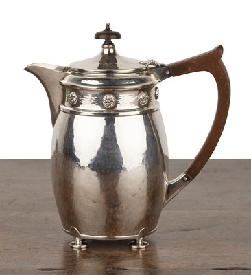 Lot 418 - Arts and Crafts silver teapot With beaten...