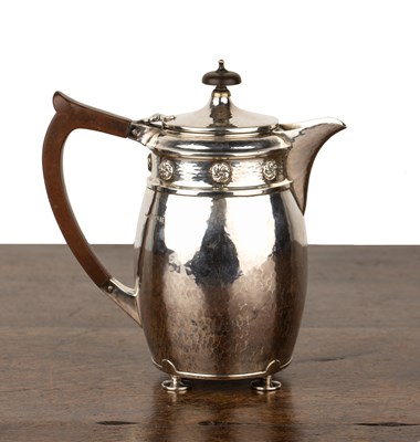 Lot 418 - Arts and Crafts silver teapot With beaten...