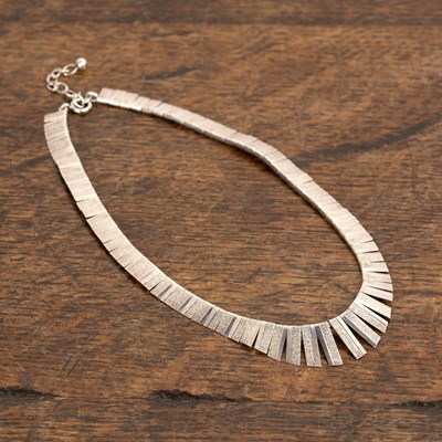 Lot 447 - Textured and articulated silver link necklace...