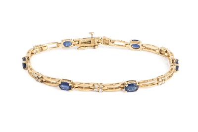 Lot 98 - A sapphire and diamond bracelet, designed as a...