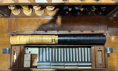 Lot 323 - Oak games compendium box with brass details,...