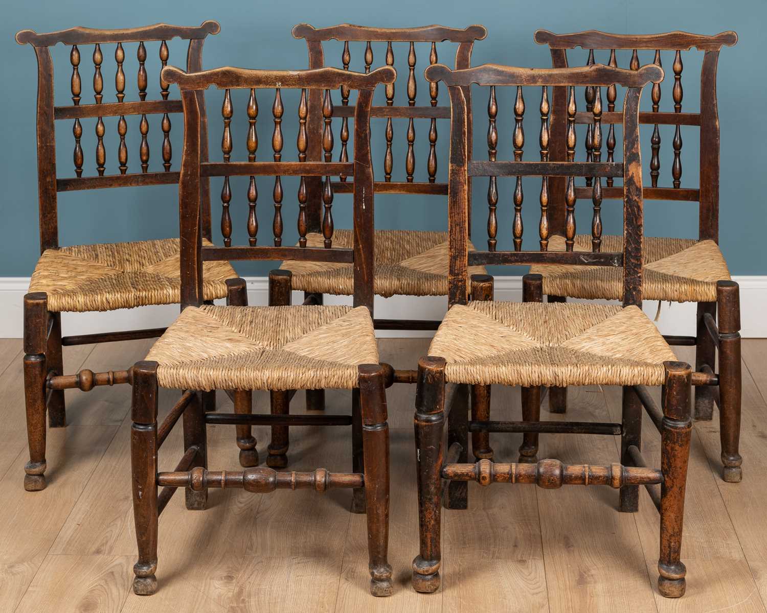 Lot 392 - A set of five fiddle-backed farmhouse chairs