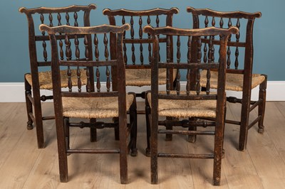 Lot 392 - A set of five fiddle-backed farmhouse chairs