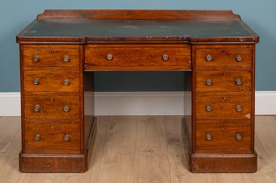 Lot 145 - A late Victorian mahogany pedestal inverse breakfront desk