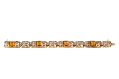 Lot 86 - A citrine and diamond bracelet, designed as a...