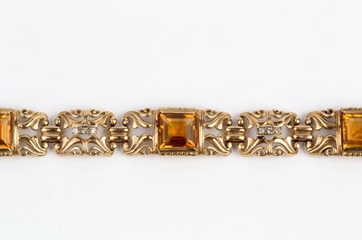 Lot 86 - A citrine and diamond bracelet, designed as a...