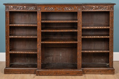 Lot 146 - A Victorian oak breakfront floor standing low bookcase