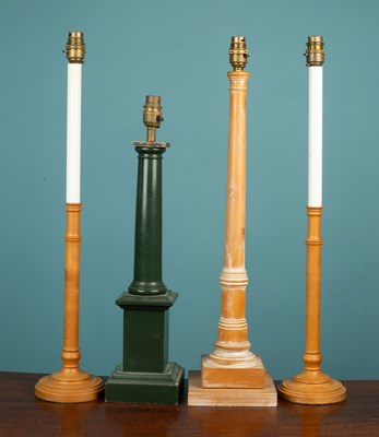 Lot 402 - A collection of four lamps