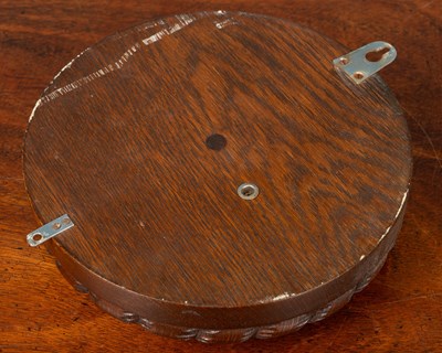 Lot 64 - A compensated marine aneroid barometer together with an Arts & Crafts mahogany adjustable book slide