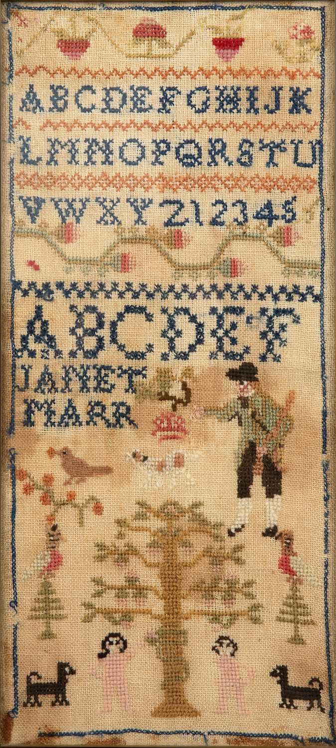 Lot 111 - A late 19th century woolwork Alphabet sampler...