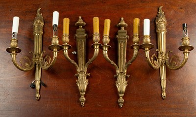 Lot 355 - Two pairs of classically styled brass two-light wall brackets