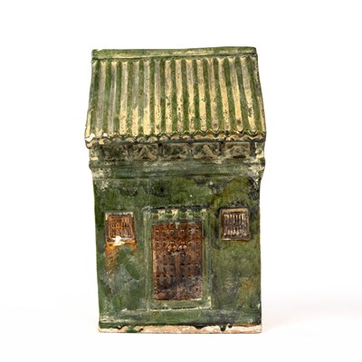 Lot 158 - A Chinese Han style green glazed model of a...