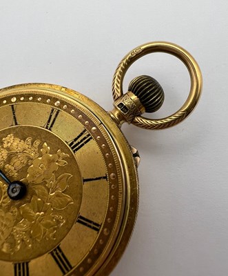 Lot 241 - An 18ct gold open face fob watch, the floral...