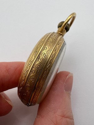 Lot 241 - An 18ct gold open face fob watch, the floral...