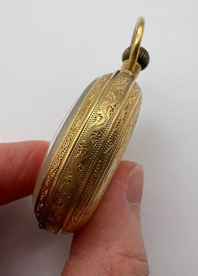 Lot 241 - An 18ct gold open face fob watch, the floral...