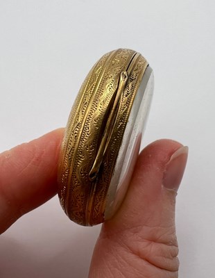 Lot 241 - An 18ct gold open face fob watch, the floral...