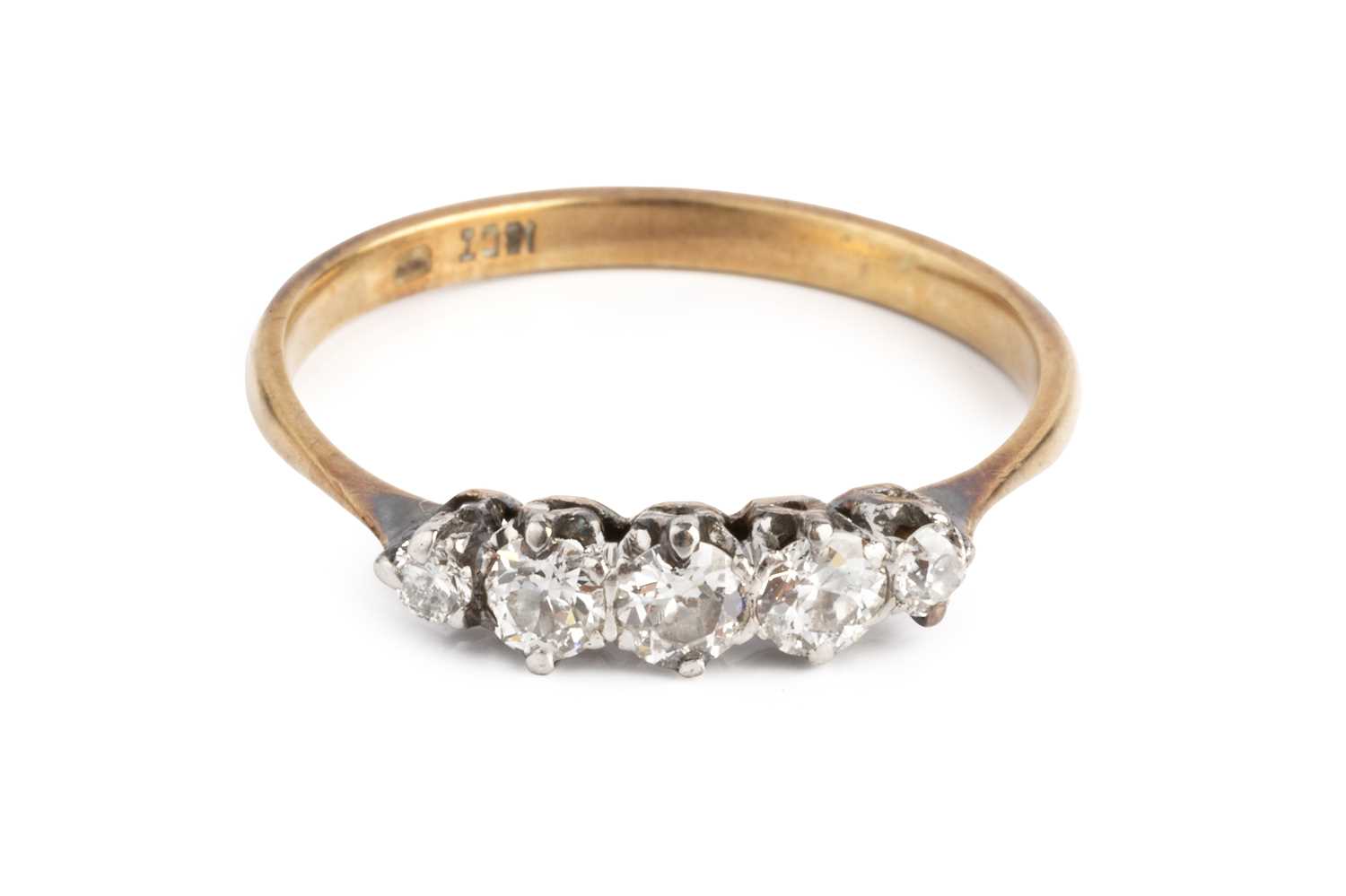 Lot 196 - A diamond five stone ring, the graduated old...