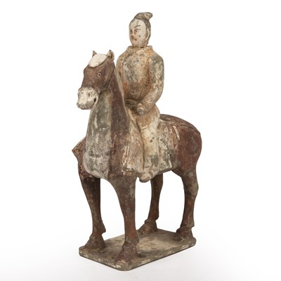 Lot 165 - A Chinese Tang style pottery horse and rider...